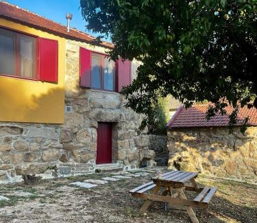 Sande House | Nascente, place in nature next to a waterfall