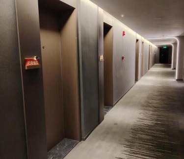Xincheng District Hotel | Nashili Hotel