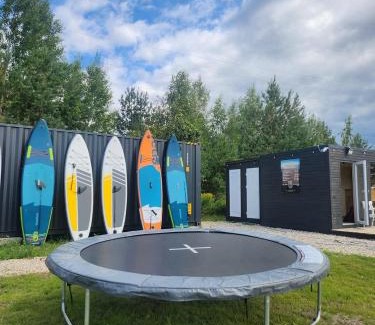 Jurmala Other | Natura Park Jurmala campsite with tent sites near a river