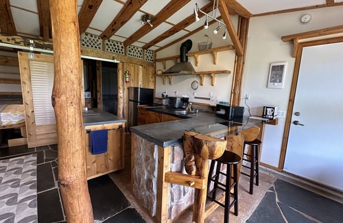Cymbria Cottage | Natural Home Built in Earthship Style on Waterfront Property