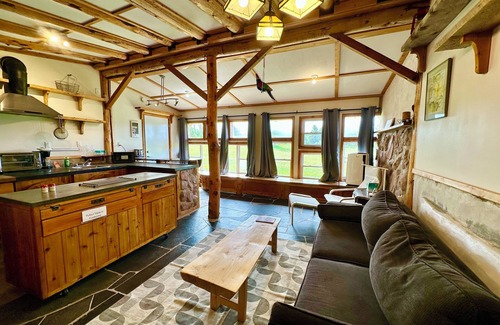 Cymbria Cottage | Natural Home Built in Earthship Style on Waterfront Property