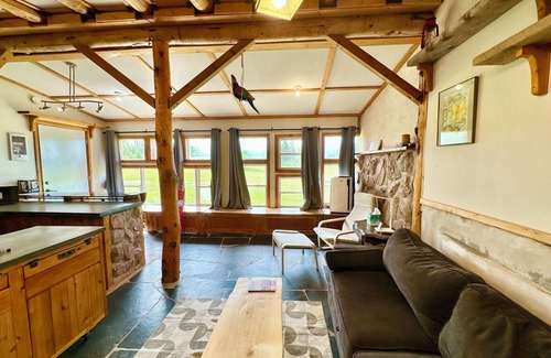 Cymbria Cottage | Natural Home Built in Earthship Style on Waterfront Property