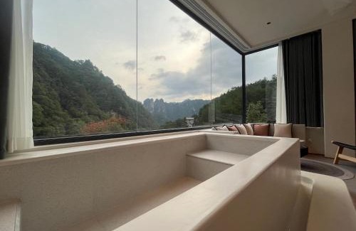 Wulingyuan House | Nature Eco Designer Hotel-Avatar mountain view,Bubble Pool,Free shuttle to south gate of Park Entrance,Local trip plan & Tourism Service,Full Renovation for 10 months