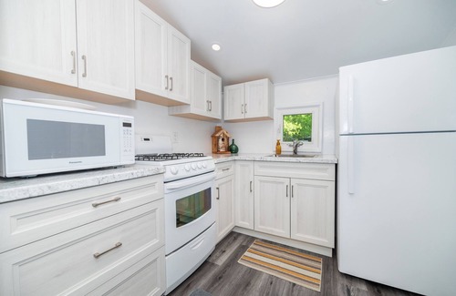 Whitewater Region Cottage | Nature Lover’s Dream – Riverfront Stay with Expansive Private Yard & Hot Tub
