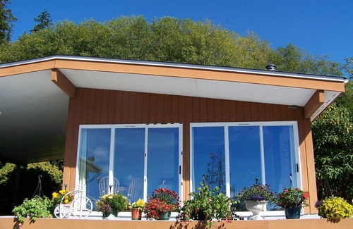 Malcolm Island House | Nature Seafront View
