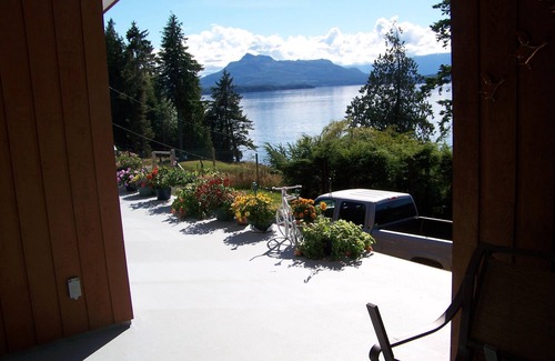 Malcolm Island House | Nature Seafront View