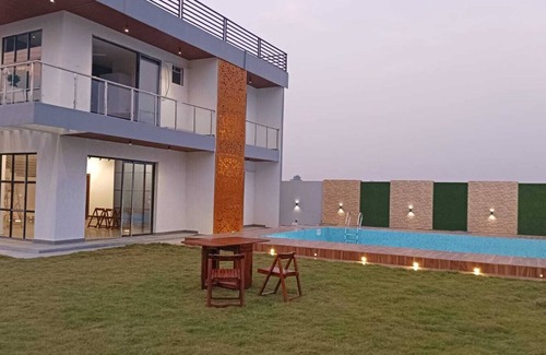 Kolkata Villa | Nature Villa With Grand Pool with four double bed rooms.