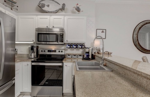 Gulf Shores Condo | "Nautical Retreat" A Luxury Beachfront Condo just steps from the beach!