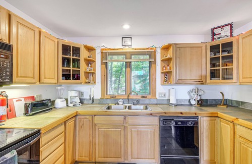 Rapid City Cabin | Near Beach Access: Torch Lake Cabin Retreat!