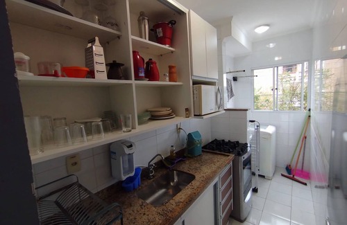 Downtown Ubatuba Apartment | NEAR THE BEACH AIR CONDITIONING WI-FI POOL BARBECUE CHAIR SUNSHINE SMART TV FILTER