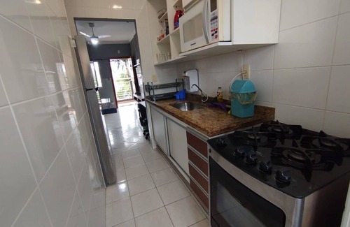 Downtown Ubatuba Apartment | NEAR THE BEACH AIR CONDITIONING WI-FI POOL BARBECUE CHAIR SUNSHINE SMART TV FILTER