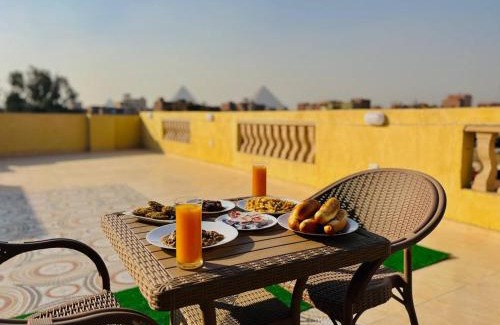 Kafrat al Jabal Hotel | Nefertiti guest house view pyramids