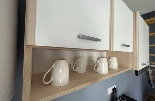 Becej Apartment | nEnchanting apartment complex with a stunning yard, gym, and sports equipment.