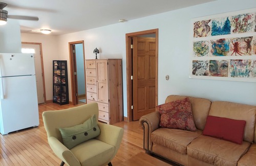 Milton Apartment | Nestled among the trees in Milton historic district.