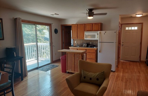 Milton Apartment | Nestled among the trees in Milton historic district.