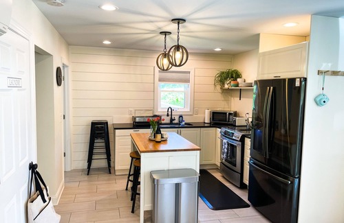 Kitty Hawk House | Nestled in live oaks trees, 3 min walk to sound, contemporary beachside cottage