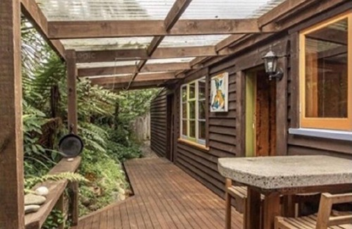 West Coast House | Nestled in the beautiful New Zealand bush a classic Kiwi bach.