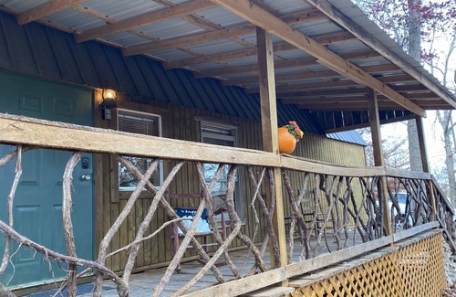 Gray Hawk Cabin | Nestled in woods a stone's throw from Daniel Boone Forest and 600 mi of trails .