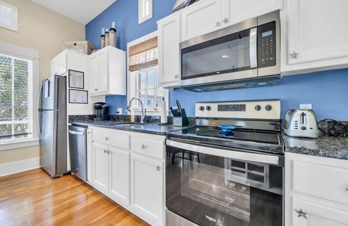 Sunnyside House | Nestled Inn is your home away from home just steps away from the beach!