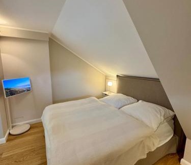 Keitum Apartment | NEU Keitum - Moderne Gemütlichkeit unter Reet