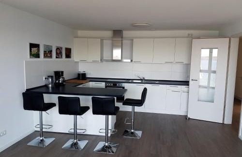 Bosau Apartment | Neubau-Ferienwohnung mit Panorama-Seeblick