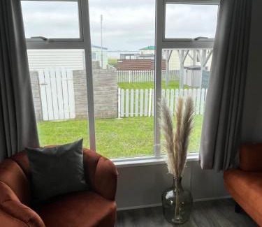 Westerland House | Neues Ferienhaus Chalet Nr73 zweite Reihe direkt am Wattenmeer, komplett eingezäunt