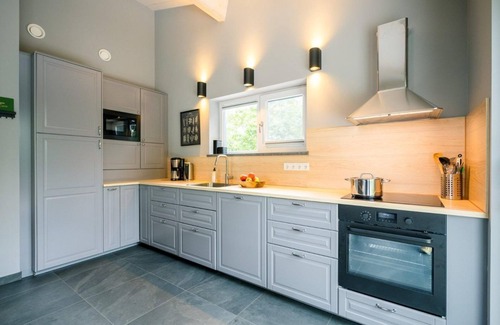 Ballum House | Neuws Holidayhome Panda with terrace on south, near woods
