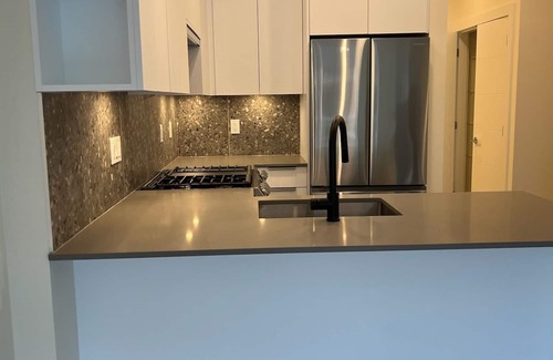 Willoughby Apartment | NEW 1 Bedroom and Den Condo with Balcony in the Heart of Willoughby Town Centre