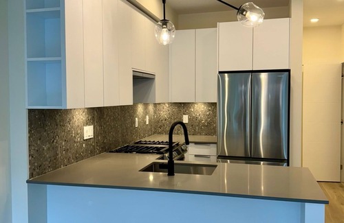 Willoughby Apartment | NEW 1 Bedroom and Den Condo with Balcony in the Heart of Willoughby Town Centre