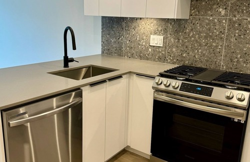 Willoughby Apartment | NEW 1 Bedroom and Den Condo with Balcony in the Heart of Willoughby Town Centre
