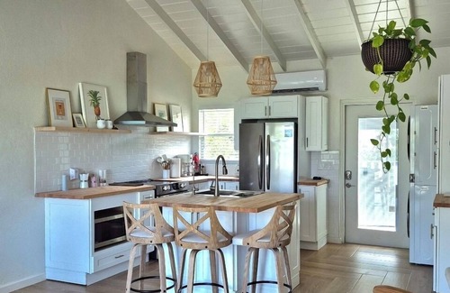 Great Exuma Villa | NEW 2 bdrm Sunrise Villa on 1+ acre tropical garden directly on Hoopers Beach