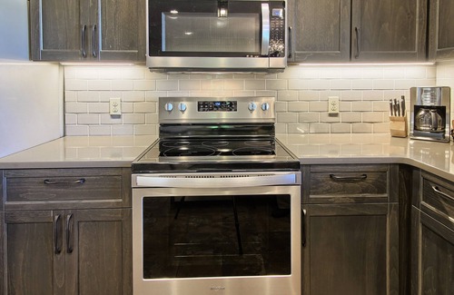 Boyne Falls Condo | New 2BR Ski In/Ski Out Creekside Condo | Complete Remodel | Private Hot Tub