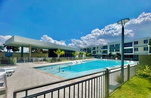 Isla Verde Apartment | NEW 3/2 GARDEN APT. FULL BACKUP GENERATOR, 2 POOLS, NEAR BEACH, GYM, 2 PARKINGS.
