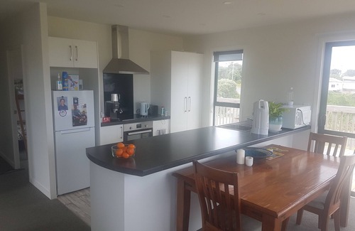 Baylys Beach House | New 4 bed 2 bath house with sea views at Baylys Beach, Northland!