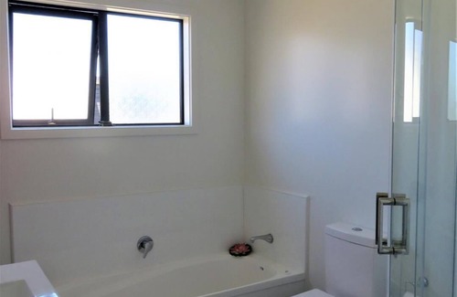Baylys Beach House | New 4 bed 2 bath house with sea views at Baylys Beach, Northland!