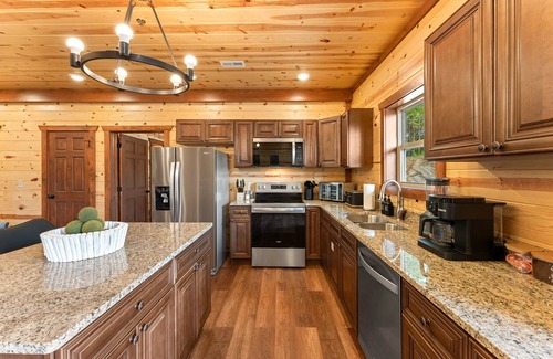 Sevierville Cabin | New 8BR Mountain Getaway | Close to PF | Private Heated Pool | Sleeps 28