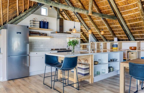 Kommetjie House | New and gorgeous Beach House with Hot Tub steps from Long Beach's surf breaks
