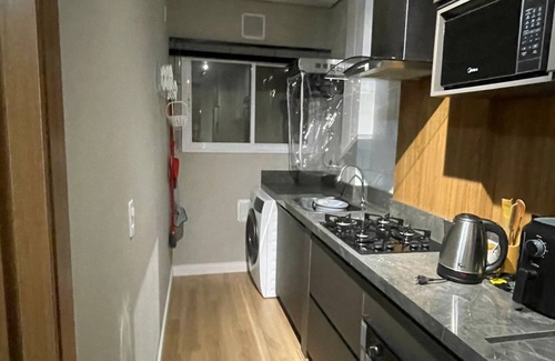 Vila Sao Jose Apartment | New apartment in the center, complete and minutes from the beaches!