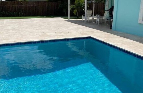 Tequesta Apartment | New Bedroom, Kitchen and Bathroom with a Pool
