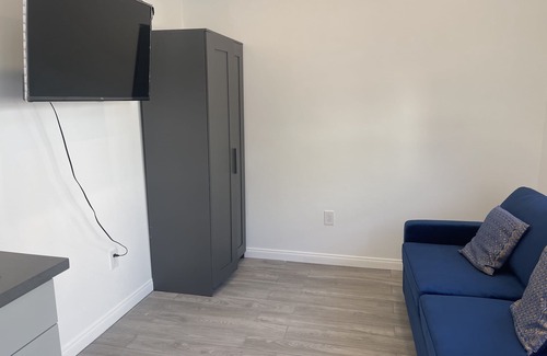 Palms House | New Built brand new fully furnished Tiny House Studio with a outdoor patio.