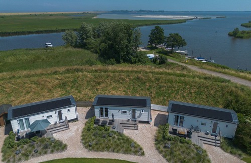 Anna Paulowna Ski Chalet | New chalet 1 on the edge of the Wadden Sea and Amstelmeer with private terrace!