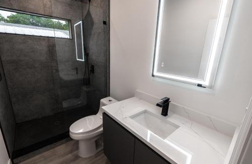 Middle River Terrace Apartment | New Construction, Built-in BBQ, 3 miles to Beaches