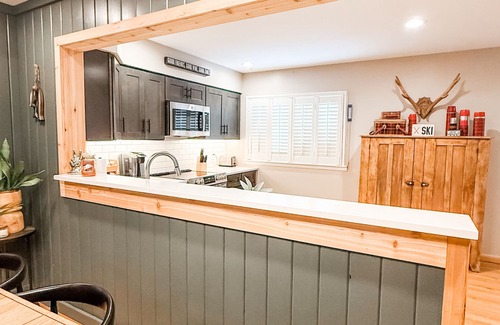 Thompsonville Cabin | NEW! Cozy 3-bedroom 2-bath, 175 ft on Betsie River, 1 mile to Crystal Mountain
