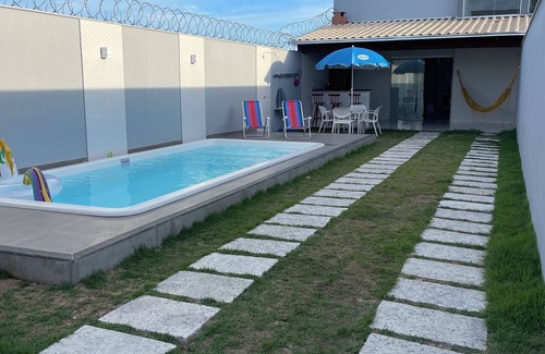 Mariricu House | New, cozy house with a beautiful pool and barbecue area.