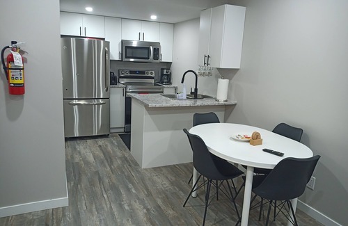 Regina House | New, cozy, one bedroom guest suite.