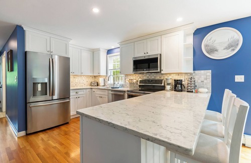 Mashpee House | NEW! Cozy Retreat w/Firepit, Large Yard & Game Room – Pool Table & Foosball!
