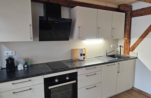 Windach Apartment | New, cozy vacation apartment in the attic with sleeping gallery, near Ammersee