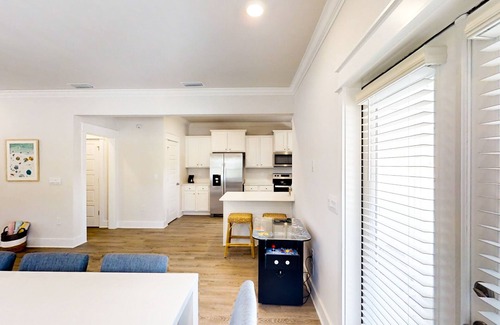 Carrabelle House | New dog-friendly home near beach & golf with pool, arcade game, decks, W/D, AC