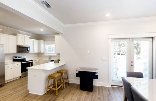 Carrabelle House | New dog-friendly home near beach & golf with pool, arcade game, decks, W/D, AC
