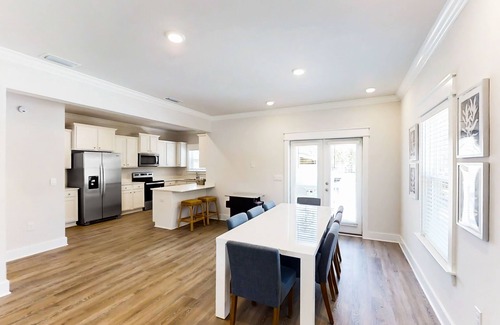 Carrabelle House | New dog-friendly home near beach & golf with pool, arcade game, decks, W/D, AC